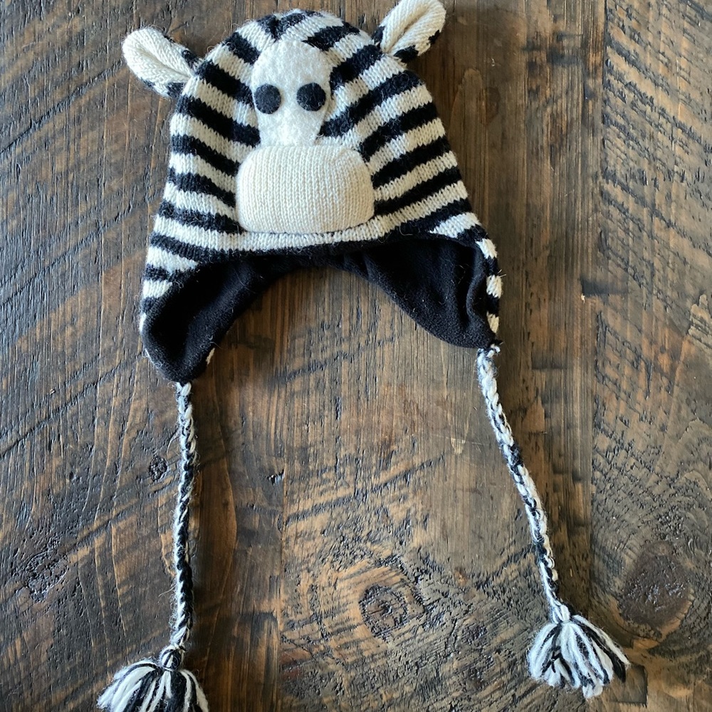 World Market Zebra Beanie Hat with strings and pom poms
